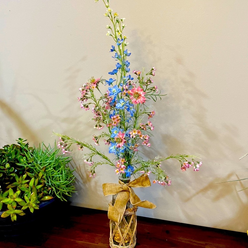 Hand crafted flowers with pebble and Jute vase.